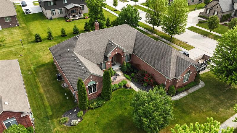 Brick home with a finished shingle roof