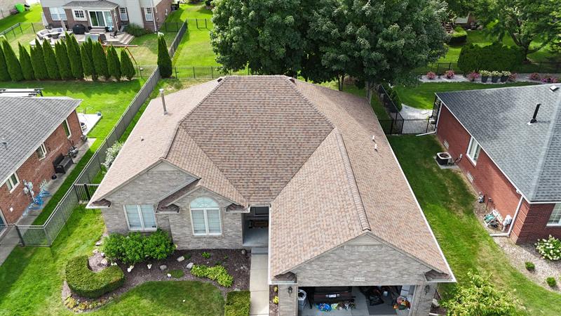 Hip roof over a brick ranch